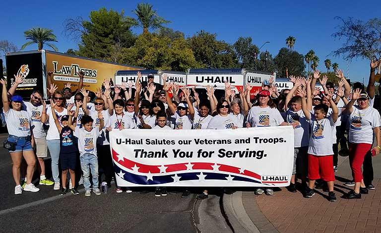 A group of people participating in The 2019 Phoenix Veterans Day Parade
