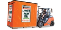 U-Box container being moved with a forklift.