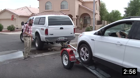 Image of How to Load a Car onto a U-Haul Tow Dolly  picture