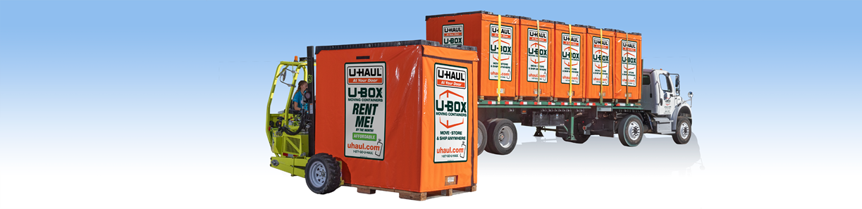 A Collection of U-Box Containers on the back of a truck and one U-Box container being lifted by a forklift