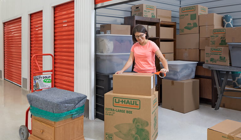 Couple loading items into an interior self-storage unit