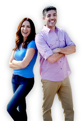 Couple smiling standing back to back