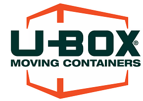 Couple loading boxes into a UBox