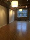 Refinished hardwood flooring, fresh paint and floor trim throughout.