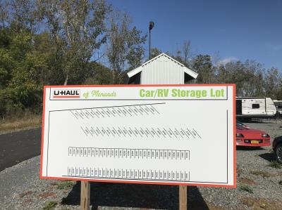 Large outside secure well lit vehicle storage area.