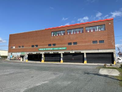 U-Haul Moving & Storage At Riverfront Preserve.  We have 3 large interior load unload areas.  You will be provided a remote clicker that will open the doors allowing you to back your vehicle into the load unload area avoiding the elements.  